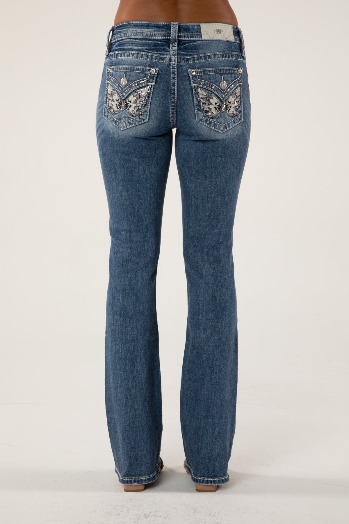 M985 Mid Rise Boot Jeans