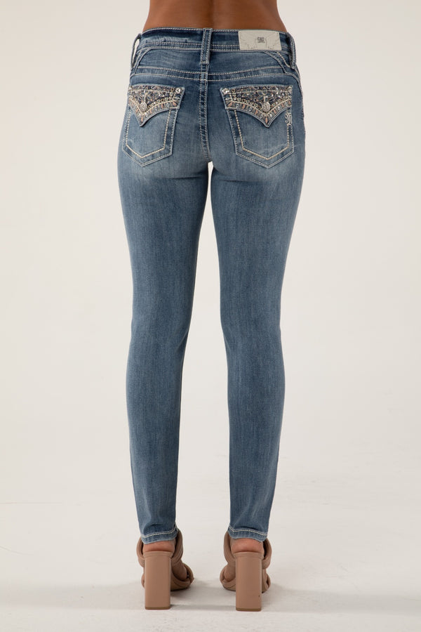 M993 Mid-Rise Skinny Jeans